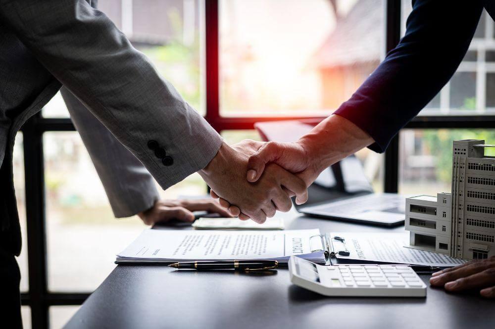 New York commercial lease attorney client handshake